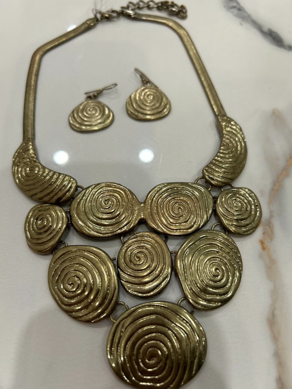 Vintage gold tone swirl statement necklace with earrings